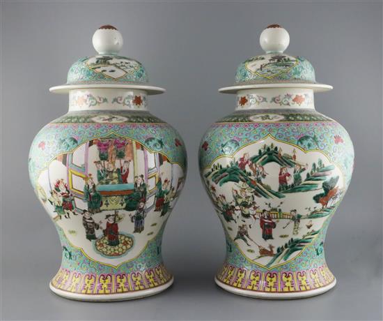 A pair of Chinese famille rose jars and covers, late 19th century, H. 45.5cm